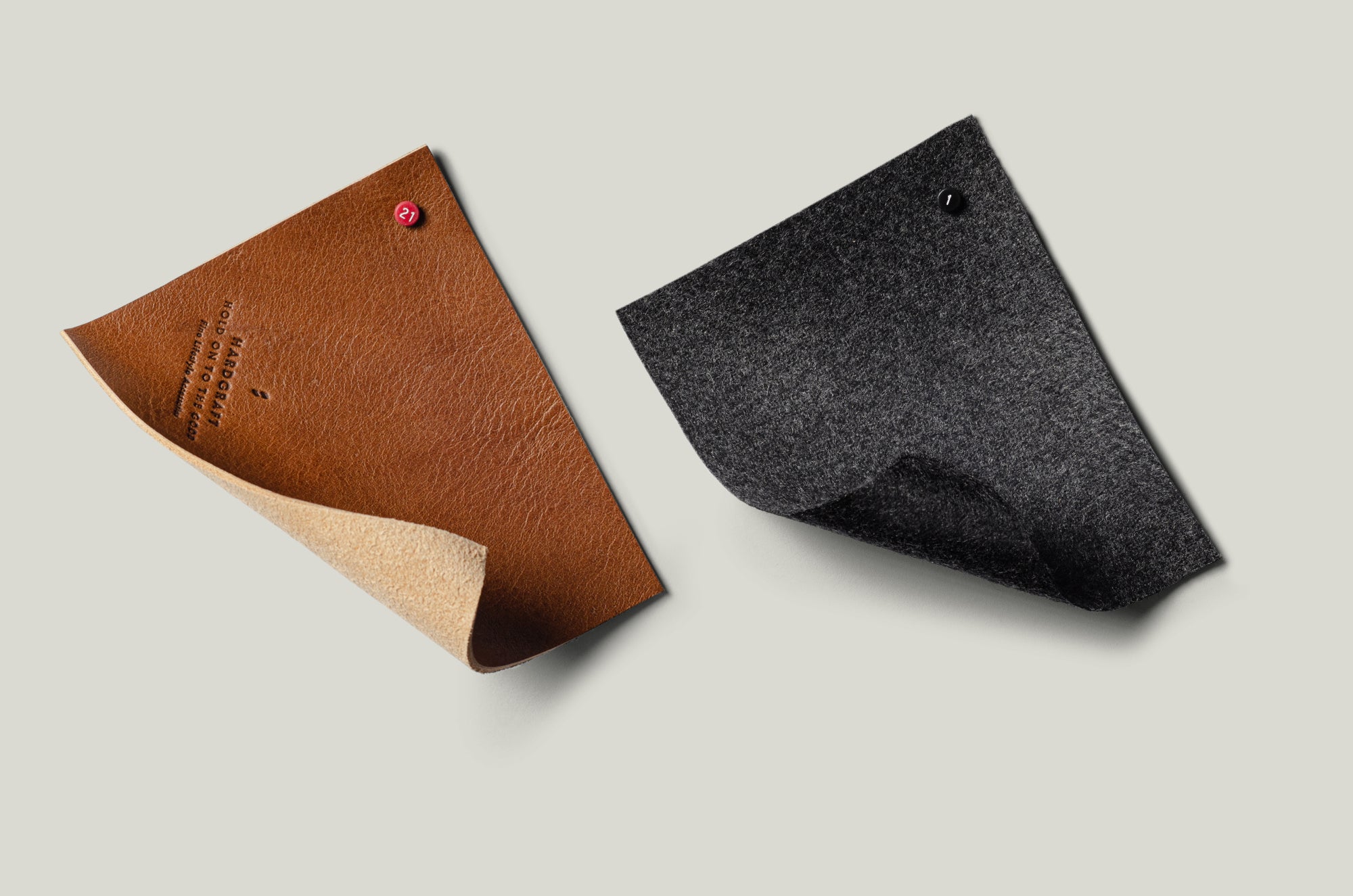 Brown leather and grey wool swatches