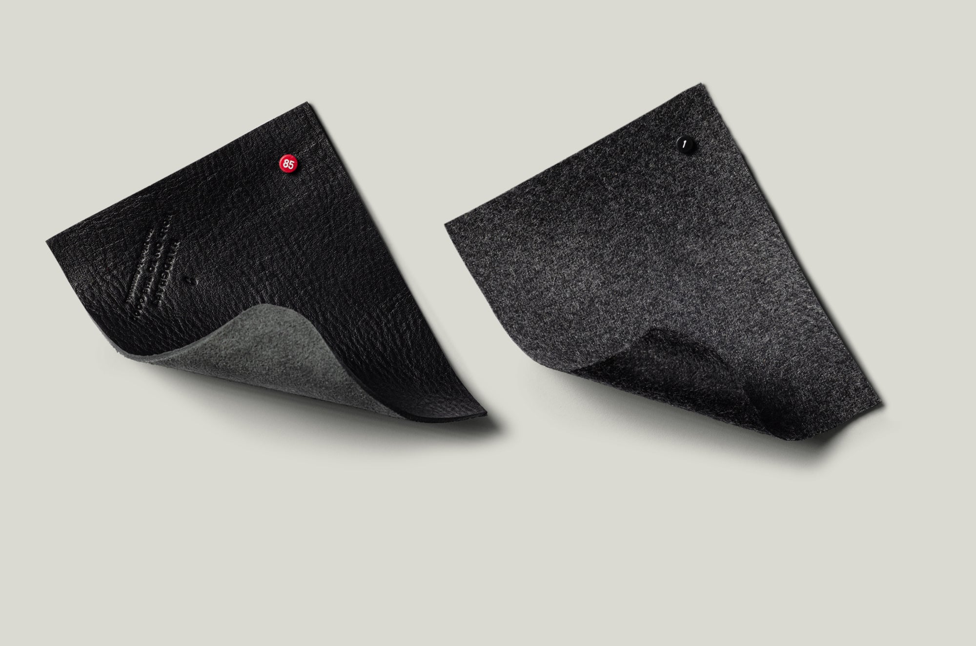 black leather and grey wool swatches