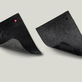 black leather and grey wool swatches