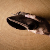Enveloppe de laine câblée. Cacao