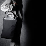 Zusammenklappbare Laptoptasche. Schwarze Kohle