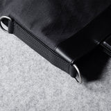 Zusammenklappbare Laptoptasche. Schwarze Kohle