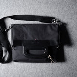 Zusammenklappbare Laptoptasche. Schwarze Kohle