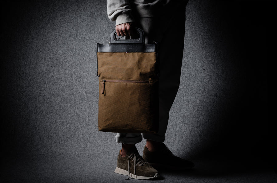 Sacoche pliable pour ordinateur portable. Noir/brun