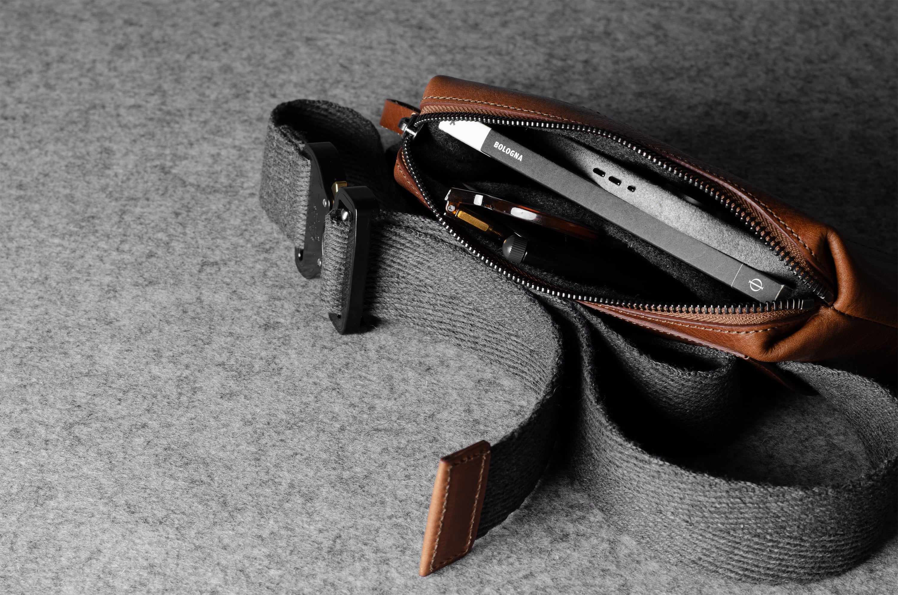 Belt bag with a zipper on a gray background