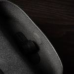 Black leather glasses case showing inside