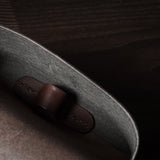 Dark brown leather glasses case showing inside