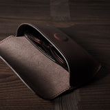 Dark brown leather glasses case with glasses