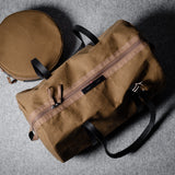 Sac de sport Team + Side Kick. Noir/brun