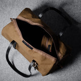 Sac de sport Team + Side Kick. Noir/brun