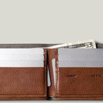 Brown leather wallet with card slots and money pocket on a light gray background