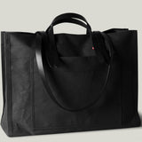 Black canvas bag with leather straps