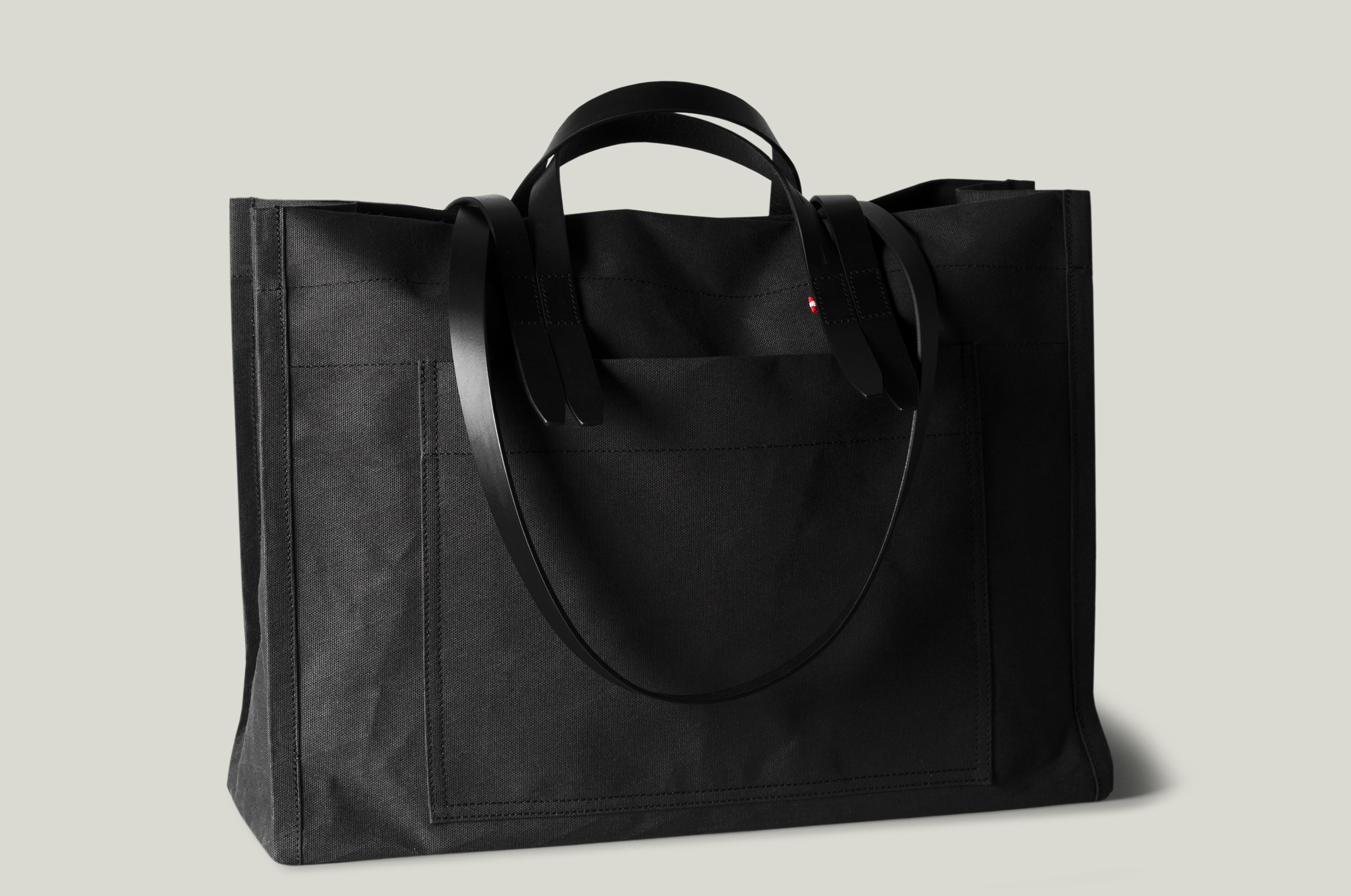 Black canvas bag with leather straps