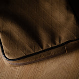 Contenu Étui pour câble de taille moyenne. Brunâtre