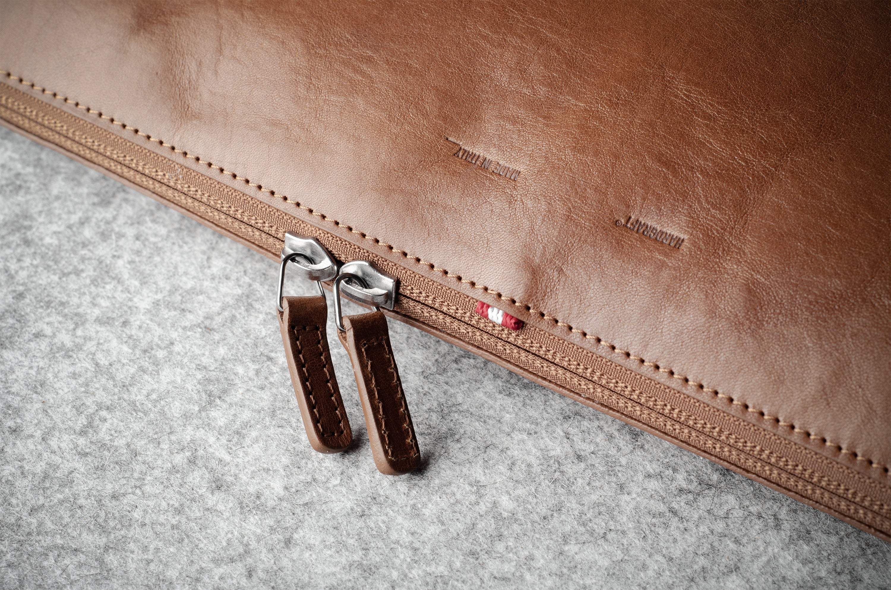 Brown leather laptop case with zip