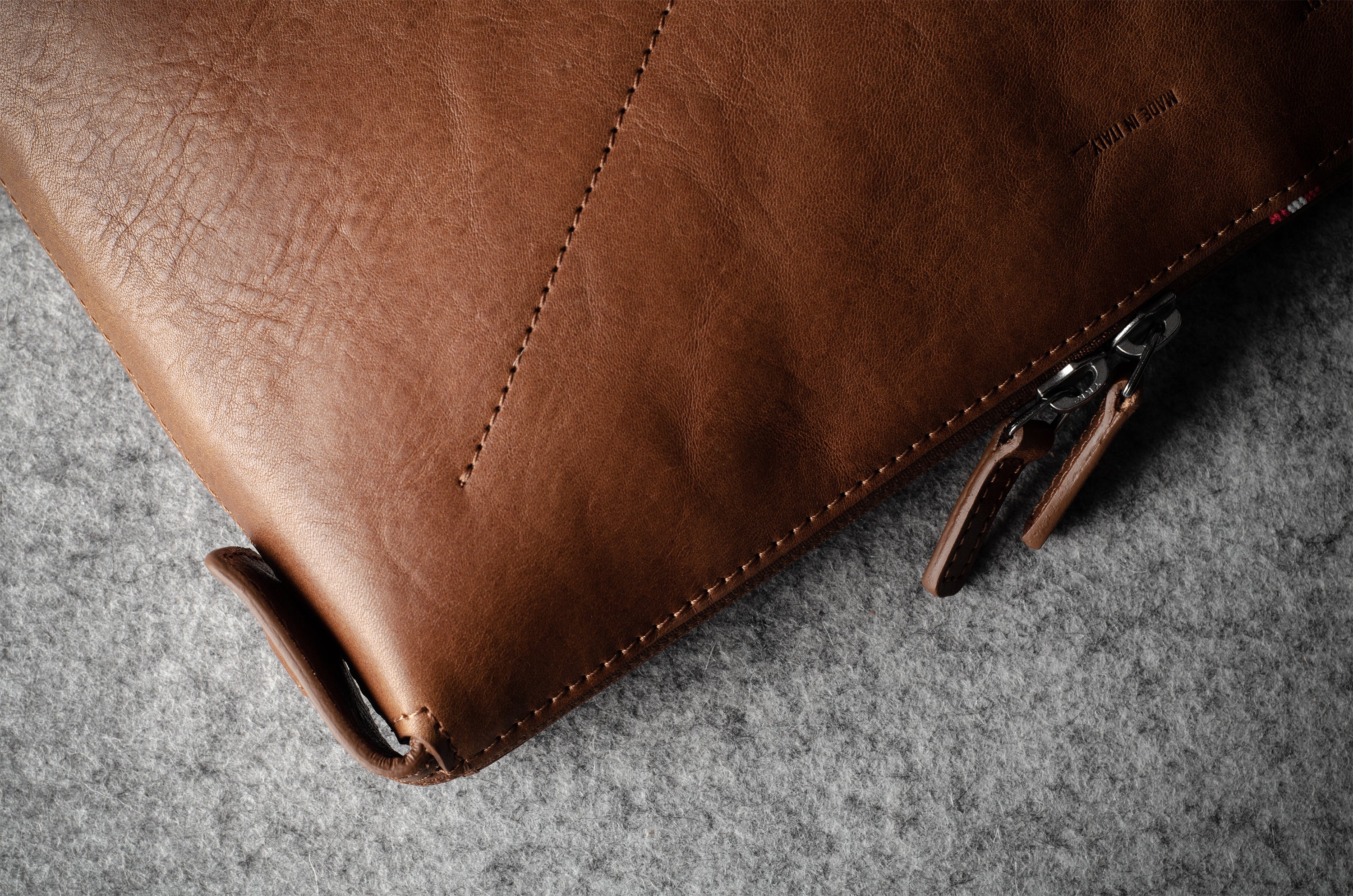 Brown leather laptop case with zip