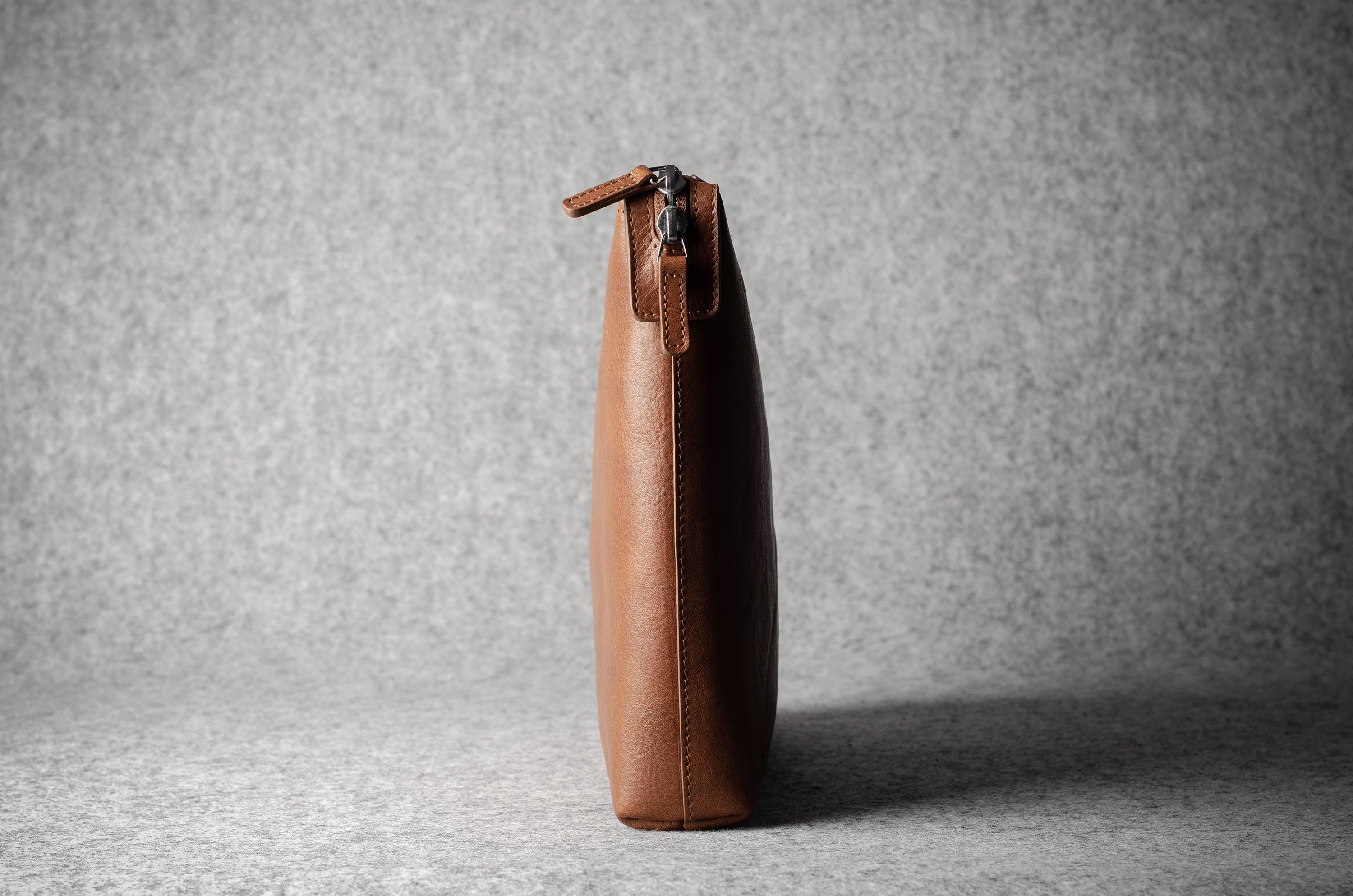 Brown leather laptop case with zip