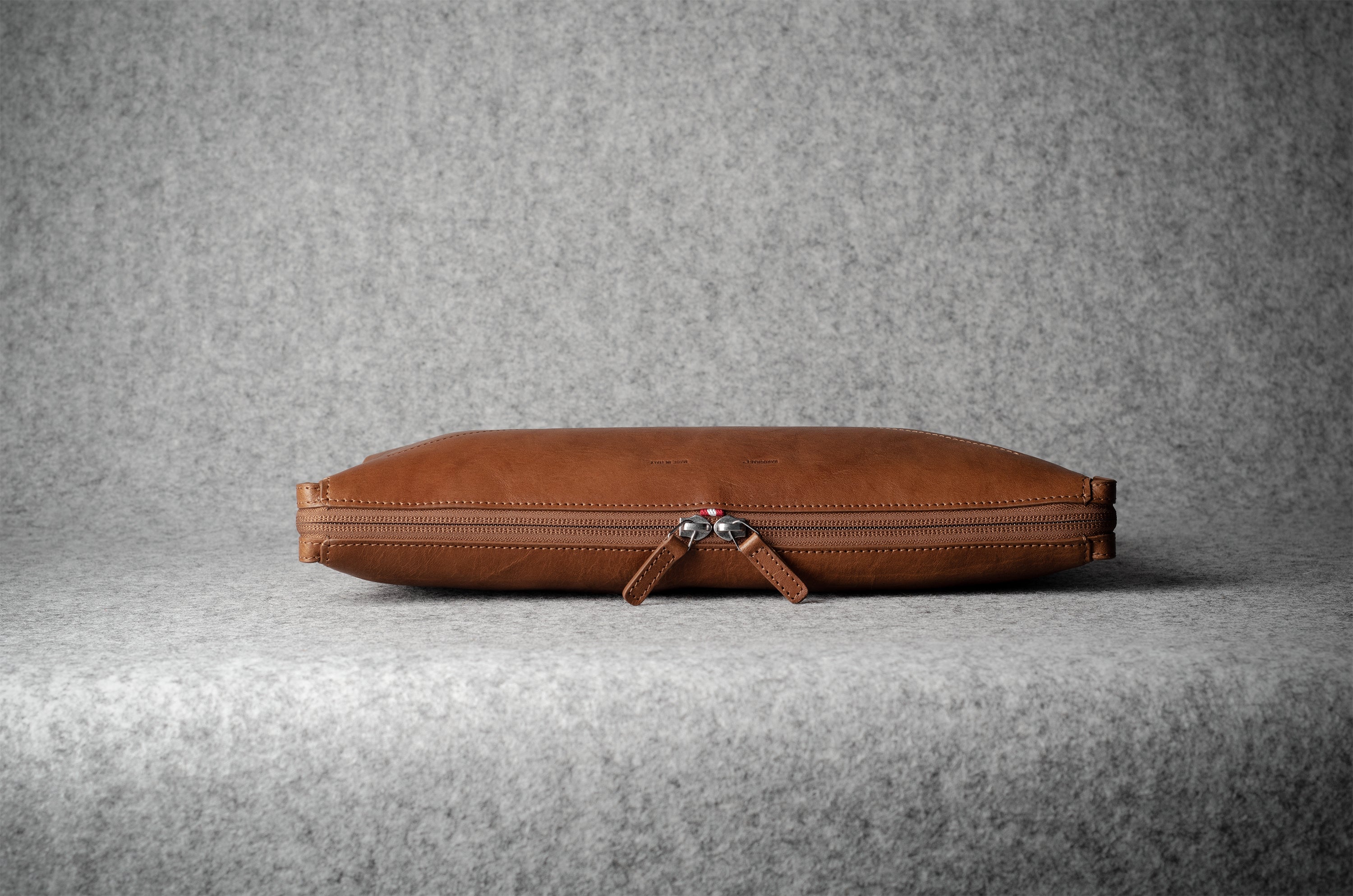 Brown leather laptop case with zip