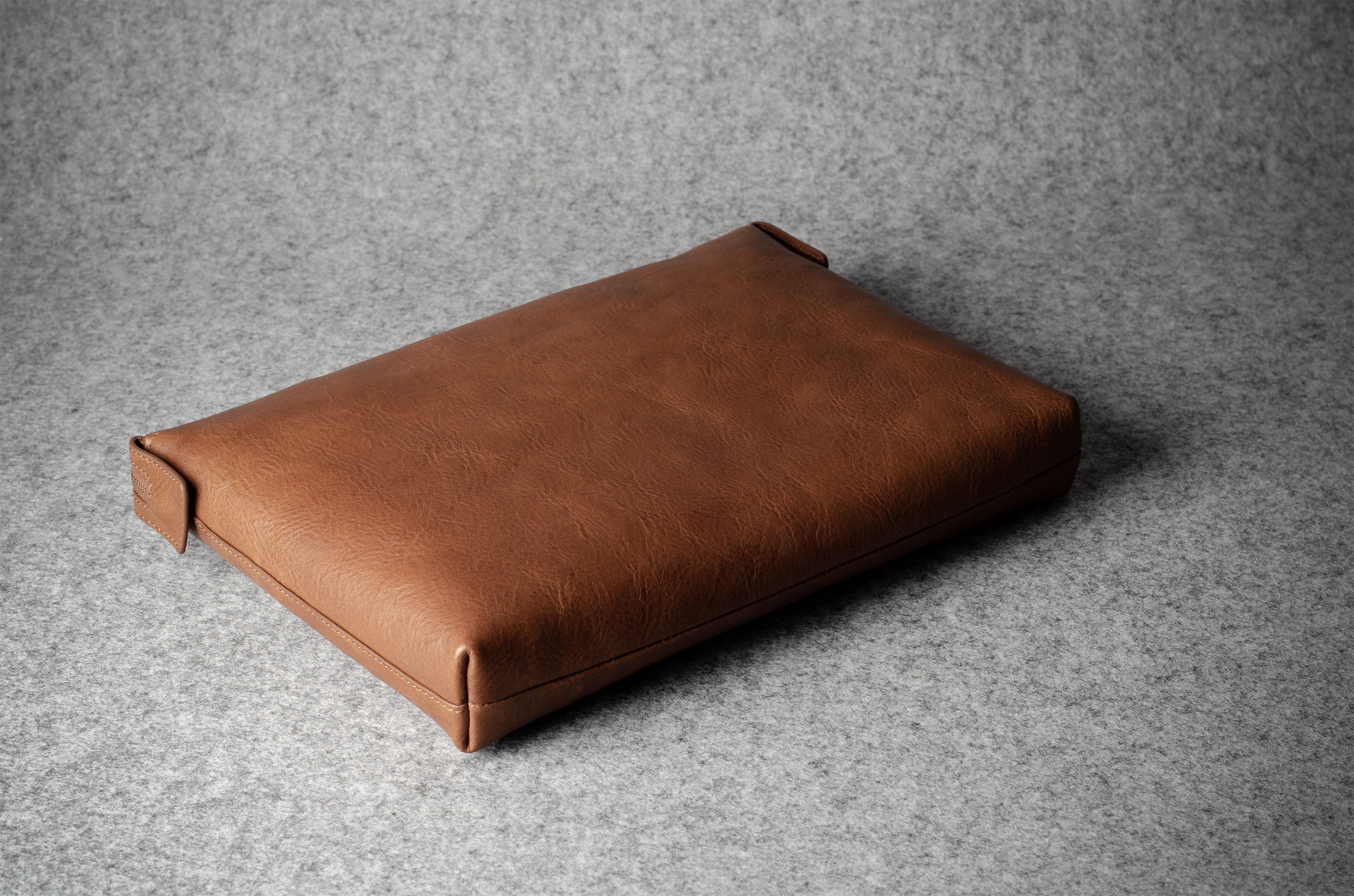 Brown leather laptop case with zip