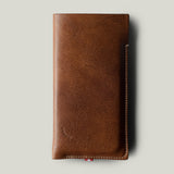 Brown leather phone case on a light gray background