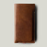 Brown leather phone case on a light gray background