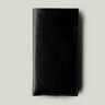 Black leather iphone case on a light gray background
