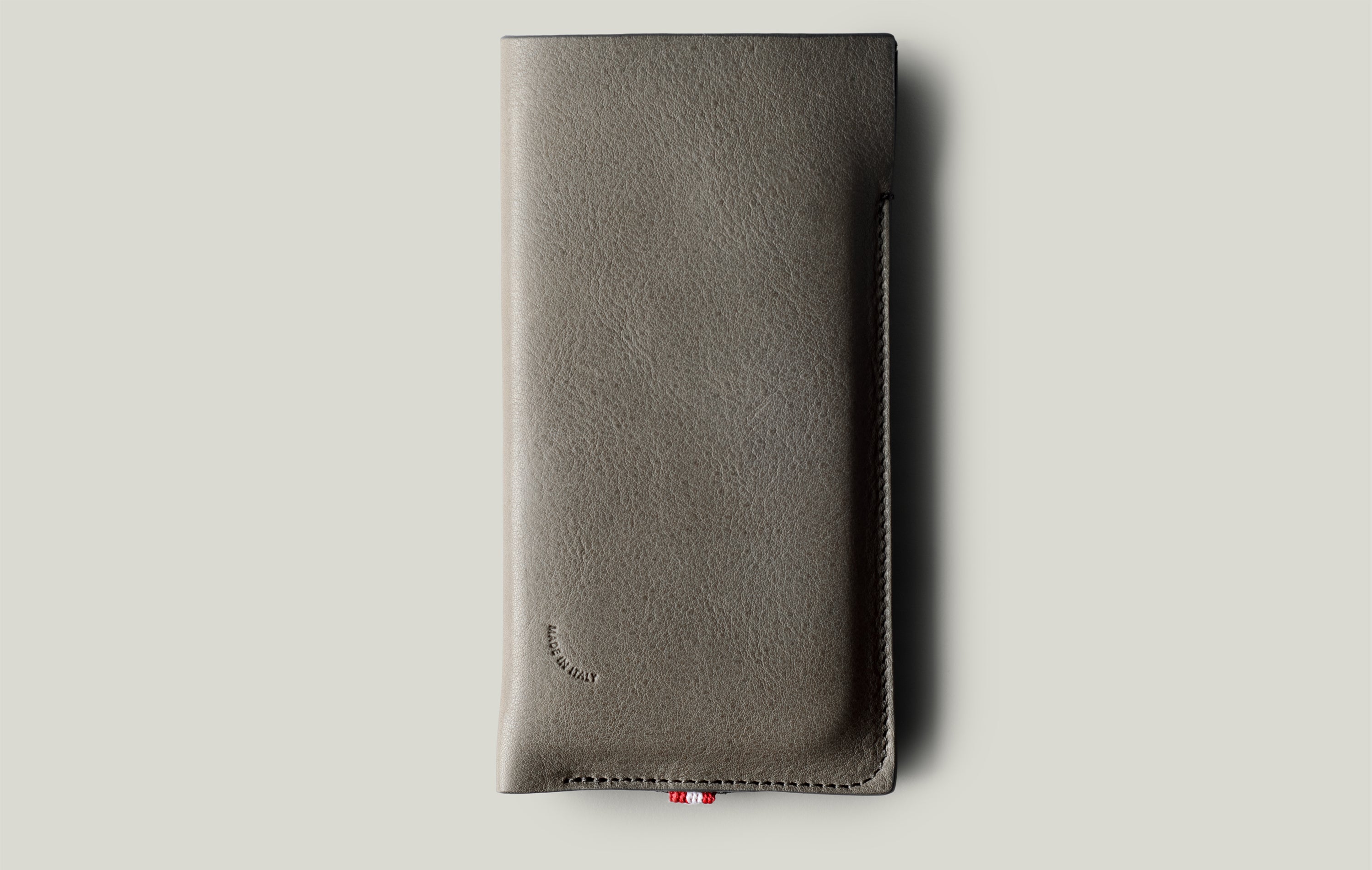 Gray leather phone case on a light gray background