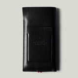 Black leather iphone case on a light gray background