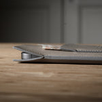 Close-up of a iphone case on a wooden surface with a blurred background