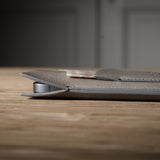 Close-up of a iphone case on a wooden surface with a blurred background