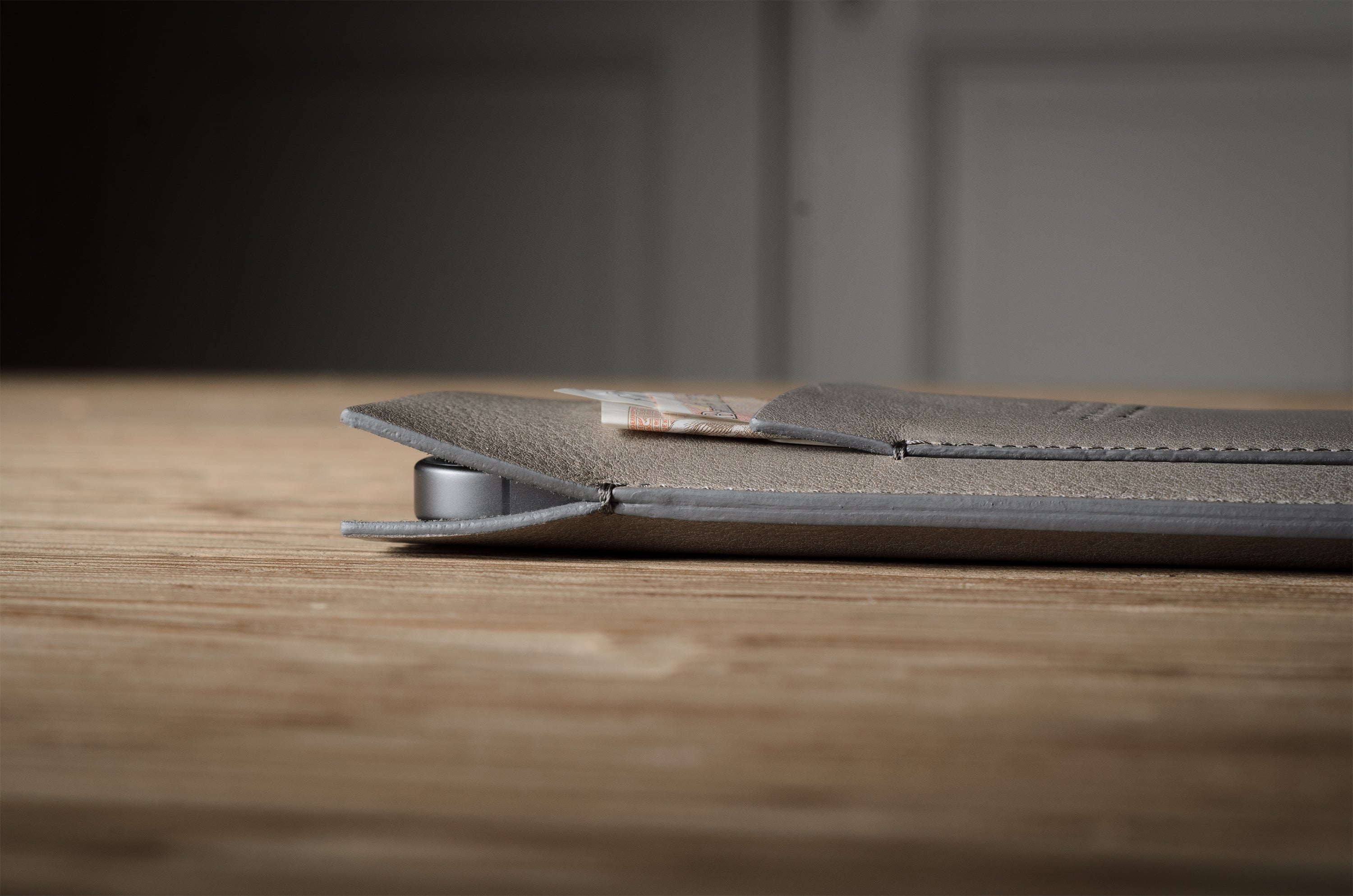 Close-up of a iphone case on a wooden surface with a blurred background