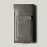 Gray leather iphone case on a light gray background