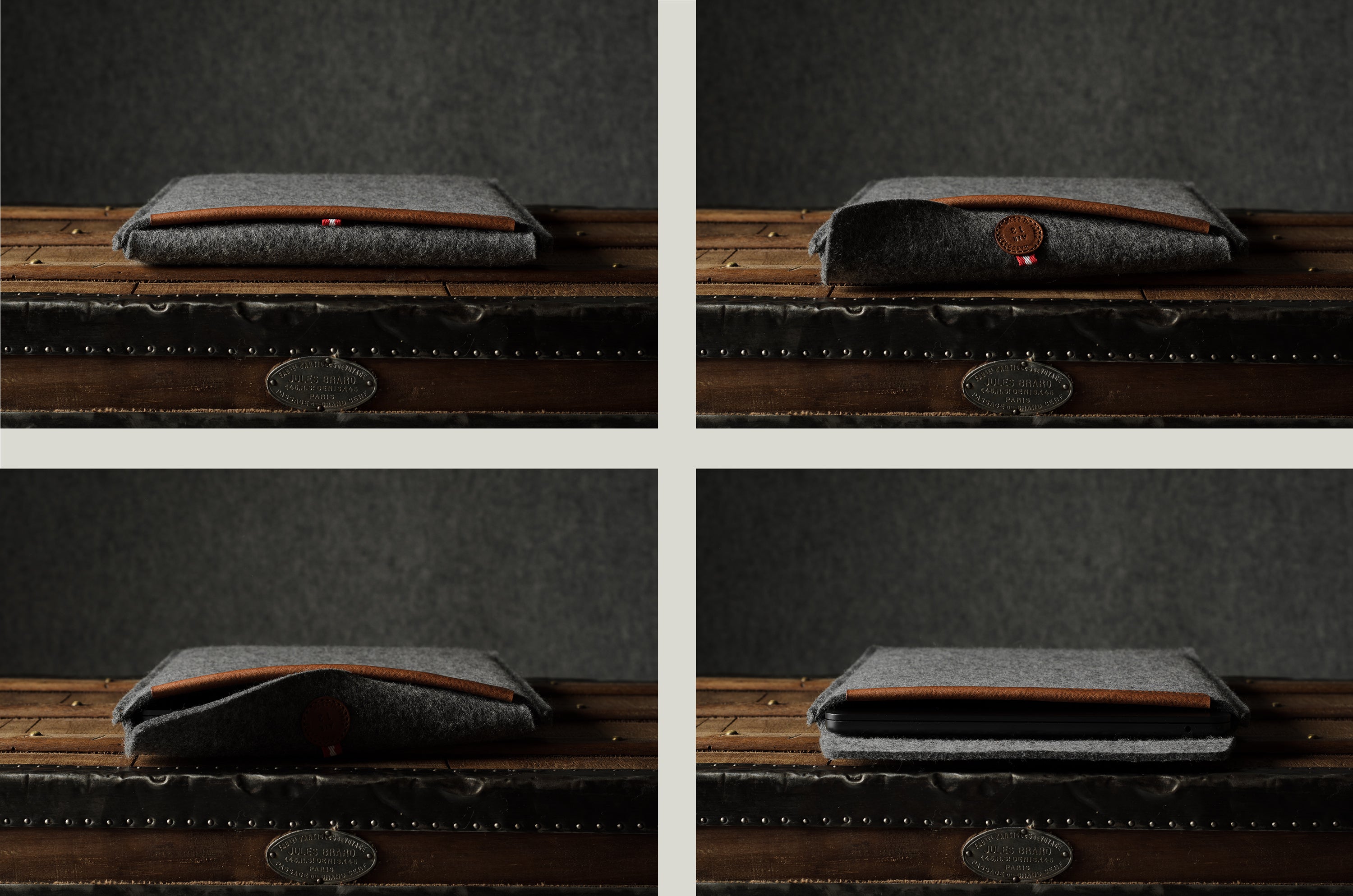 Gray wool felt laptop sleeve with brown leather on a wooden surface