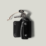 Palm Key Fold. Charbon