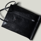 Sac à livres en cuir Poet. Charbon