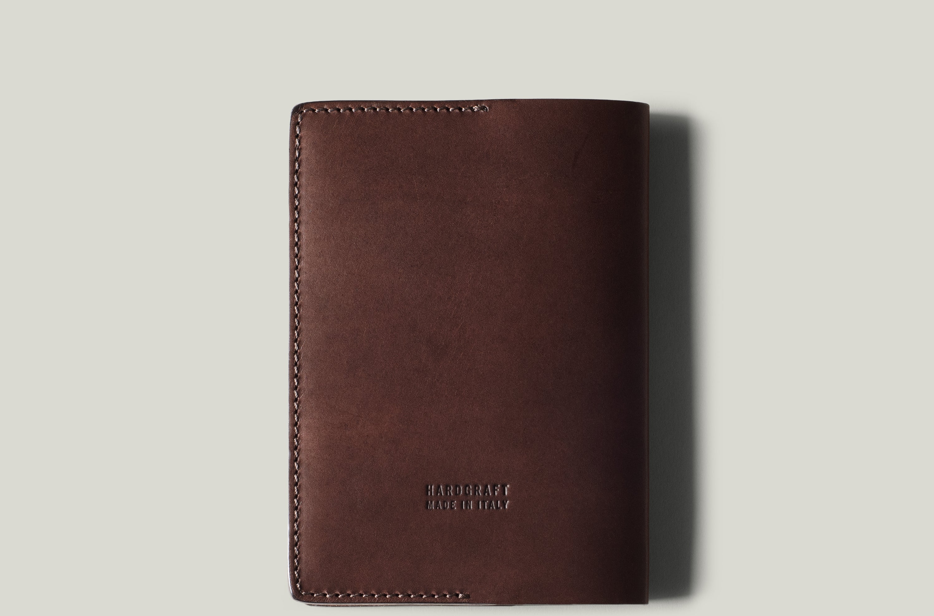 Brown passport Case on light background