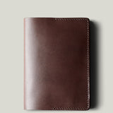 Brown passport Case on light background