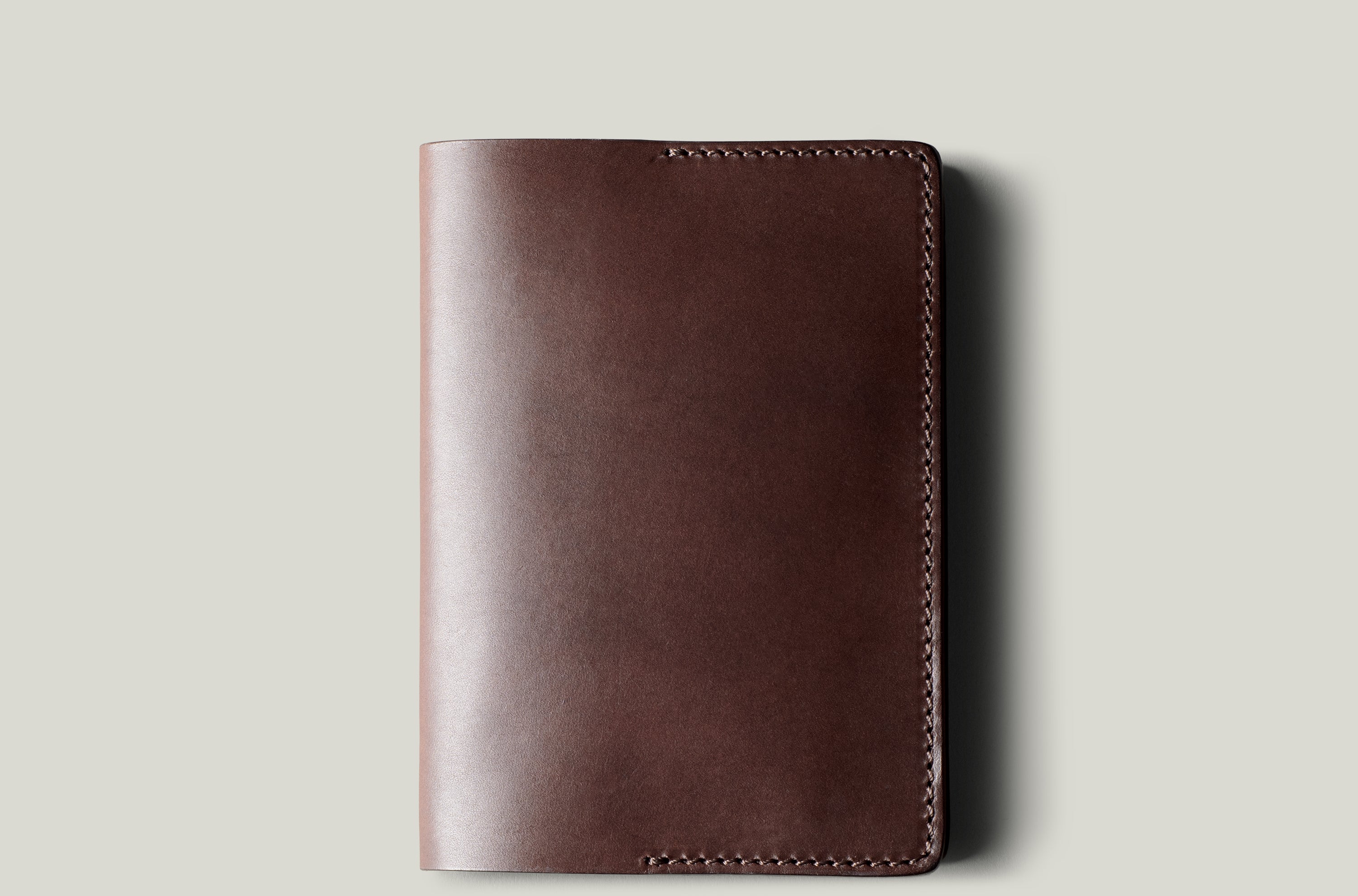 Brown passport Case on light background