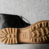Bottines Chukka noires tissées
