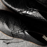 Bottines Chukka noires tissées