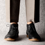 Bottines Chukka noires tissées