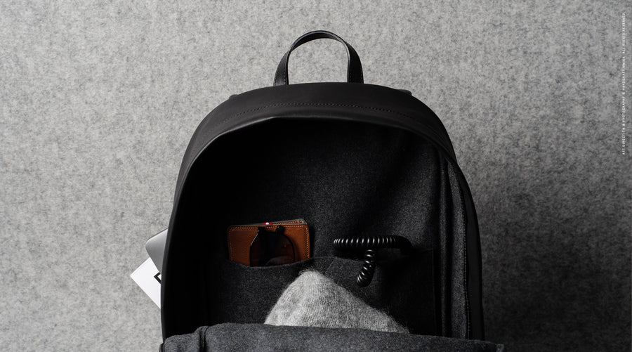 Well-Rounded Backpack . Black Coated