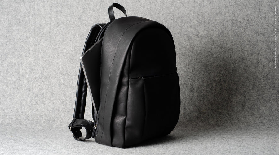 Well-Rounded Backpack . Black Coated