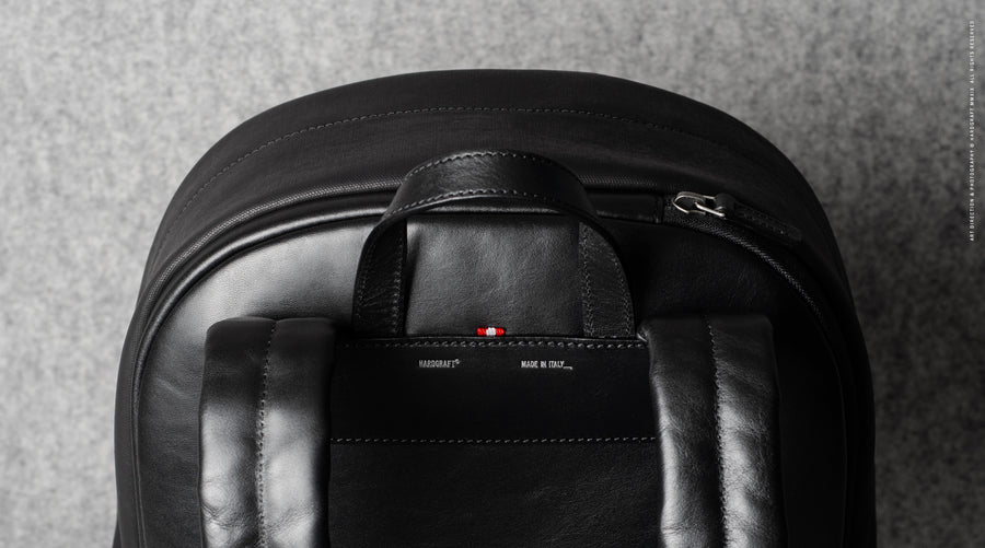 Well-Rounded Backpack . Black Coated