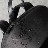 Well-Rounded Backpack . Black Coated